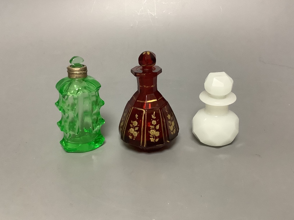 Eight overlaid glass scent bottles